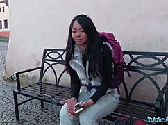 Stranded Thai girl gets facial from a stranger in public outdoor action