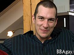 a gay porn video featuring a guy with a large wang getting fucked hard