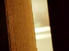 I spied on the prostitute shaving her hairy pussy in the hidden spot.