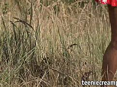 nubile teen feels pleasure with big dildo outdoors