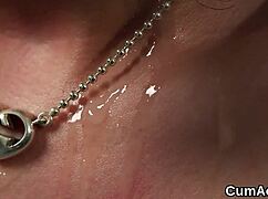 Foxy hottie receives a cumshot on her face