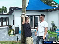 Muscular gay uncle teaches nephew a wild lesson outdoors