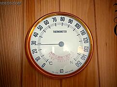 this doll is bound in latex with a condom and mask under control