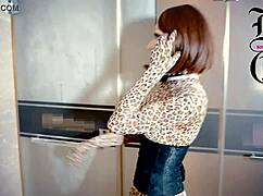 this doll is bound in latex with a condom and mask under control