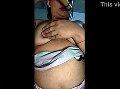 Hot young girl showing off her big natural tits