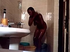 Shower time turns nasty with sweet ebony Kuzy in this sexy reality scene.