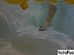 Nadia White enjoys a solo bath with rubber ducks and other pleasures