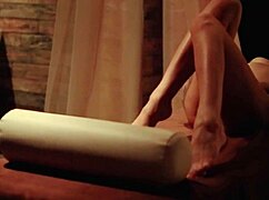 Young beauty gets a massage with oil and enjoys solo pleasure