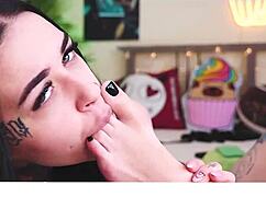 Teen brunette with piercing gets feet and pussy worshipped in BDSM