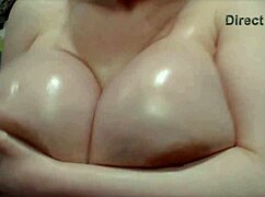 Pinky Powers enjoys a relaxing session with oiled toys and dildo