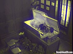 Watch This Couple Get Caught Fucking Hardcore In A Coffin!