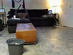 horny gay nudist sweeps the house while stroking his hard cock.