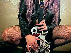 rocker caresses pussy with vibrator and plug