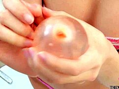 Innocent 20-year-old Chiaki Narumi in micro bikini pops water balloons wet