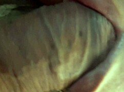 Close up of a big black cock and hairy balls being licked by an amateur