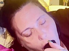 Chubby girl enjoys sucking a big black cock in the bedroom