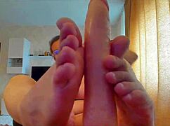 Big Sex Toy Sucked And Footjob With Natural Tits