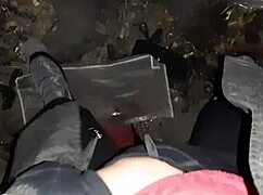 A girl from the village rubs herself in the cold barn