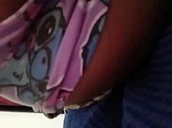 Young woman gropes her natural tits in homemade solo video