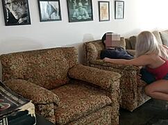 A blonde is fucking with a married photographer in his office