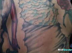 Tattooed mature woman expertly sucks cock in point of view blowjob scene