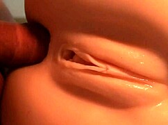 admiring the nice doll's close-up features in a fetish scene