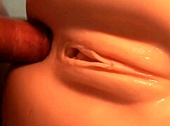 admiring the nice doll's close-up features in a fetish scene