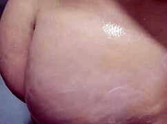 I play with my tits in the shower