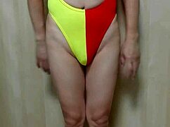 Schoolgirl in bloomers and sheer lingerie plays with anal toys.