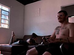 Behind the scenes, naked woman sucks Carmona while playing video game