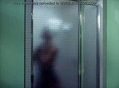 do you see this sexy ebony girl showering nude in the bathroom?