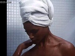 do you see this sexy ebony girl showering nude in the bathroom?
