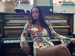 Big booty ebony Playboy model Harley Dean strips down in a studio. She reveals every curve with confidence.