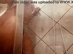 Girl Filmed in Shower Flaunting Her Hairy Pussy