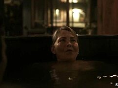 Feeling the passion as Gaby Hoffmann and Cherry Jones get intimate in transparent outfits.