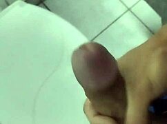 A young professional takes a break at work to relax quietly, focusing on personal tasks without distractions.