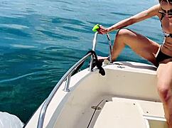Man, washing the boat in a sexy thong swimsuit screams summer
