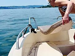 Man, washing the boat in a sexy thong swimsuit screams summer