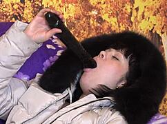 milf in down coat with fur hood sucks big dildo in wild positions! 😍