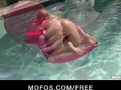 the sexy blonde in a bikini strips down outdoors and starts masturbating her perfect ass