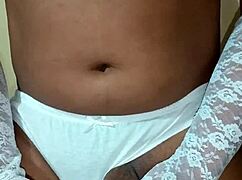 thai ladyboy teases in seductive white panties and matching bra