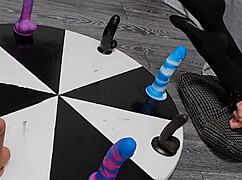 Wheel of dildos she wants to win her orgasm here