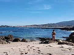 curvy nudist flashing her hairy pussy on the beach