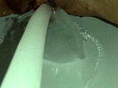 Amateur Gretala Applies Soap To Her Trimmed Pussy In Video