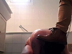 Slave undergoes hard training with piss and blowjob