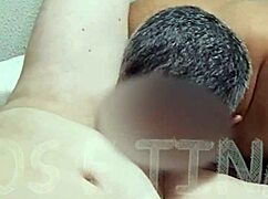 Husband and wife sharing an intimate moment in bed