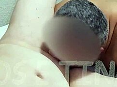 Husband and wife sharing an intimate moment in bed