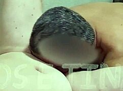 Husband and wife sharing an intimate moment in bed