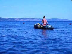 on boat cruising volga river in bikini