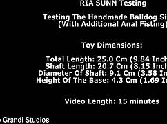 OMG, Ria Sunn is wild testing that huge handmade balldog size L with extra anal fisting! 😱